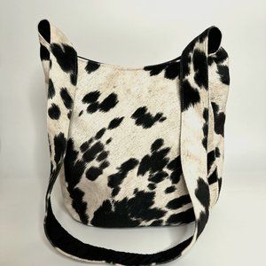 Spicer Bag Sling Bag - in Black & White Faux Cow Print